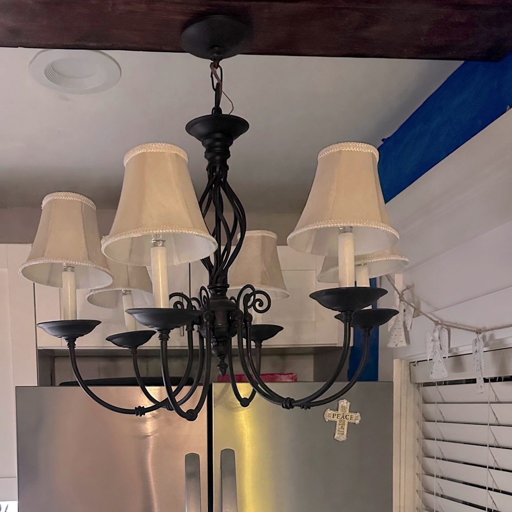 Selling this black iron chandelier